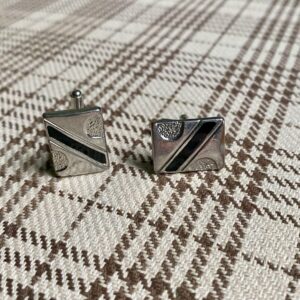 Silver cufflinks with black diagonal stripe